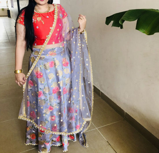 Picture of Tomato red colour crop top and lehenga