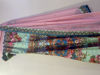 Picture of A multi colour printed  gown with sequence work with a heavy net dupatta