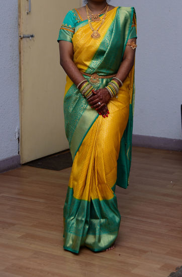 Picture of Yellow Fancy Saree with hand work blouse