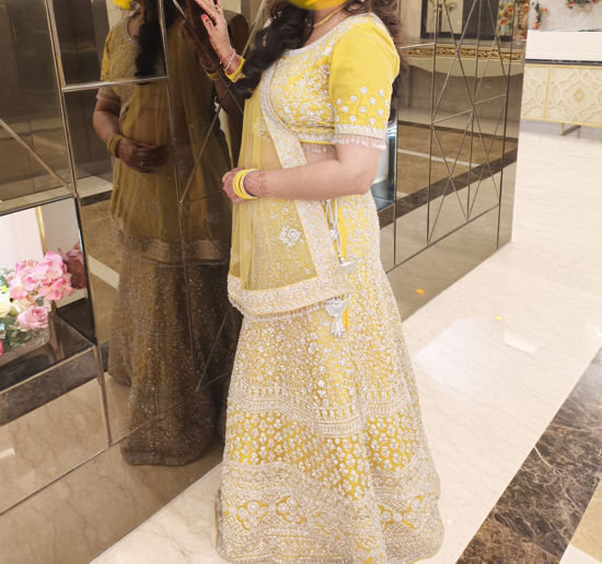 Picture of Pretty Yellow Lehenga with all over Silver work