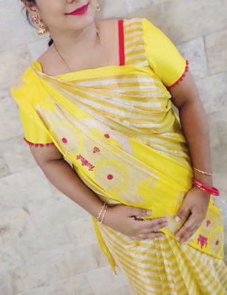 Picture of Gold and yellow tissue saree with pattern blouse