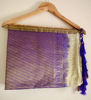 Picture of White pattu saree with gold border