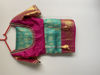 Picture of Sea green with pink Kanchi pattu saree