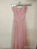 Picture of Peach colored self thread embroidered long net Princess frock