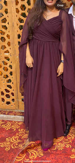 Picture of maroon pleated gown