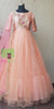 Picture of Peach and pink 2 layered hand work net long Frock