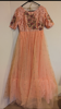 Picture of Peach and pink 2 layered hand work net long Frock