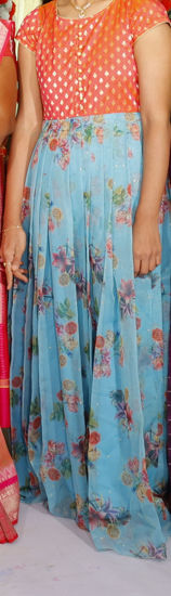 Picture of Orange shade and blue floral long Frock