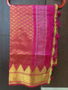 Picture of Pink pattu saree with contrast blue blouse