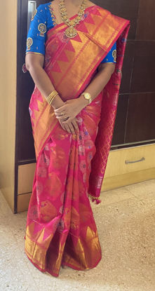 Picture of Pink pattu saree with contrast blue blouse