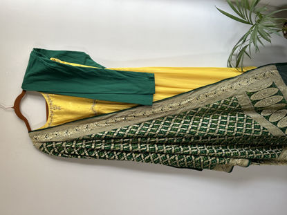 Picture of Yellow hand work anarkali with green bhandhini duppata