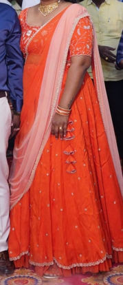 Picture of Orange Lehenga with handwork