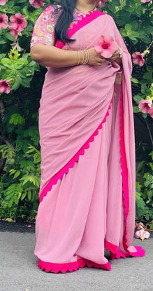 Picture of Georgette saree with scallop border