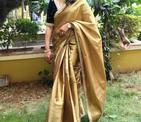 Picture of Golden semi tissue saree without blouse