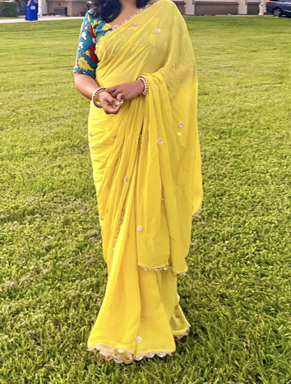 Picture of Yellow saree and kalamkari blouse