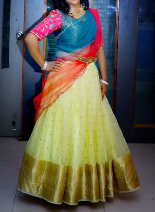 Picture of Cream colored netted Lehenga