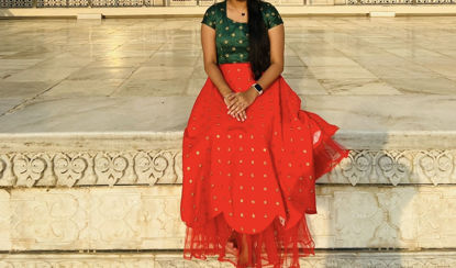 Picture of Red and green frock with scallop border