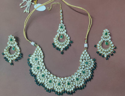 Picture of kundan necklace with earrings and maang tika