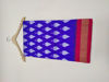 Picture of Ikkat pattu saree with stitched blouse