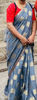 Picture of Grey colour Banarasi saree with contrast red colour raw silk blouse