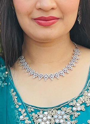 Picture of Silver toned necklace with matching earrings
