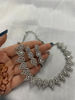 Picture of Silver toned necklace with matching earrings
