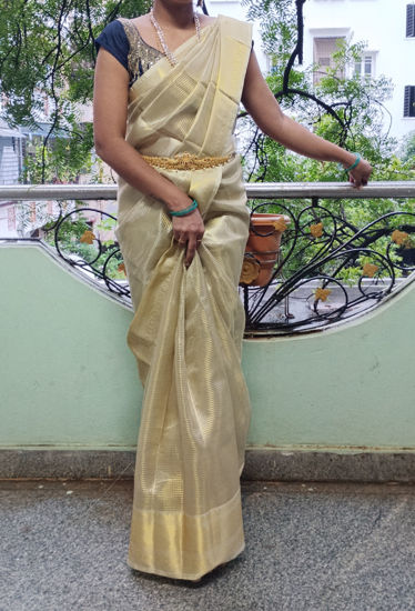 Picture of Gold soft tissue pattu saree without blouse