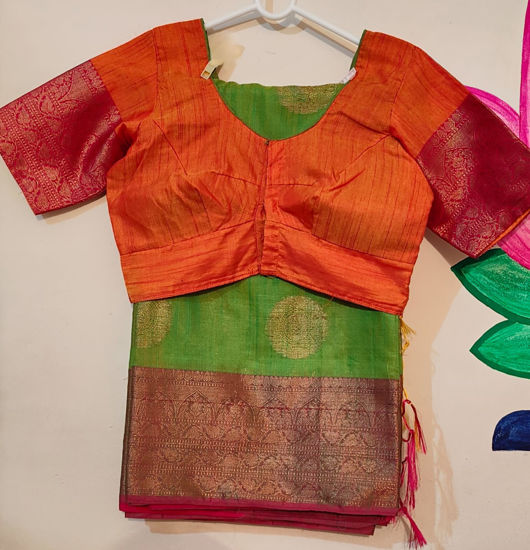 Picture of Beautiful green with orange saree