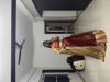 Picture of Oranage pink with gold zari Lehenga