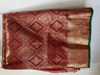 Picture of Maroon pattu saree with all over peacock design (semi soft kanchipattu)