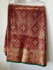 Picture of Maroon pattu saree with all over peacock design (semi soft kanchipattu)