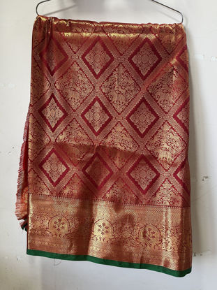 Picture of Maroon pattu saree with all over peacock design (semi soft kanchipattu)