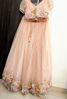 Picture of Beautiful peach based lehenga with a subtle shimmer and multicolour floral embroidery.