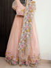 Picture of Beautiful peach based lehenga with a subtle shimmer and multicolour floral embroidery.
