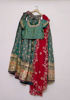 Picture of Green langa voni with maggam blouse and cutwork dupatta