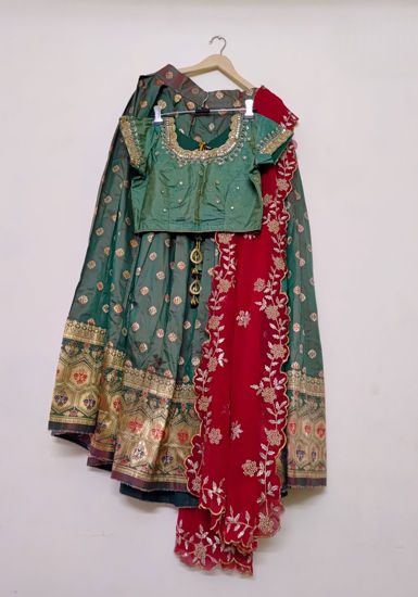 Picture of Green langa voni with maggam blouse and cutwork dupatta
