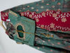 Picture of Green langa voni with maggam blouse and cutwork dupatta