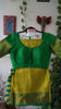 Picture of Classy yellow and green pattu saree