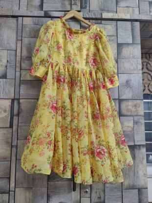 Picture of Yellow floral mid length frock