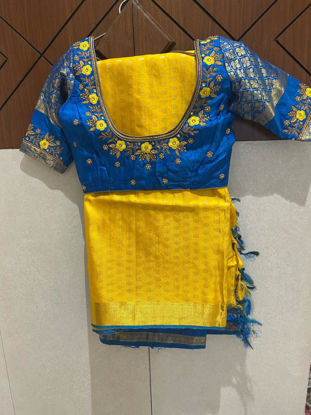 Picture of Lemon Yellow kanchi saree with copper blue big border