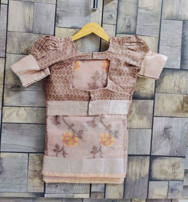 Picture of Rose gold saree with silver border