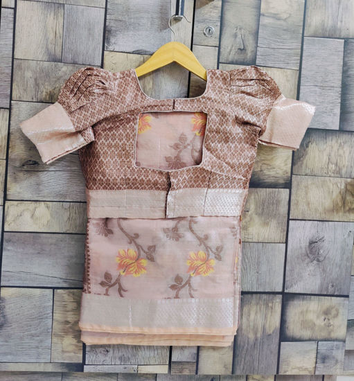 Picture of Rose gold saree with silver border