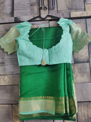 Picture of Vintage inspired bottle green saree
