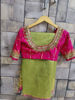 Picture of Parrot green uppada tissue Saree with pink blouse with multicolour embroidery