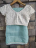 Picture of Never worn ice blue saree with embroidered white blouse