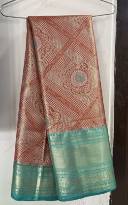Picture of Blue and orange combination pattu saree