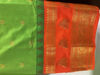 Picture of Green with orange semi gadwal saree