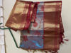 Picture of Never worn Peacock weave pattu  red border saree  with unstitched blouse