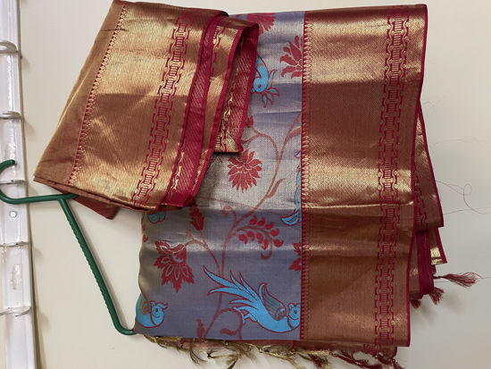 Picture of Never worn Peacock weave pattu  red border saree  with unstitched blouse