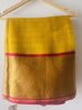 Picture of Yellow organza saree with contrast pink kora border